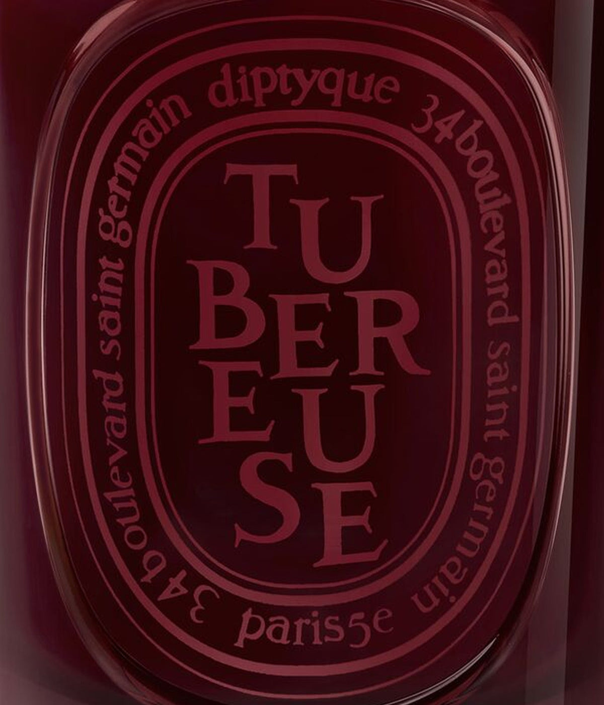 Diptyque Duftkerze Tubéreuse 300 g, graviertes Ovaletikett auf rotem Glas