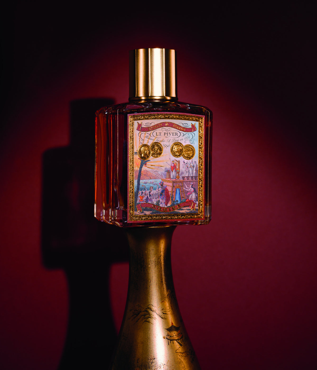 Extrait de Parfum Nohiba – L.T. Piver, still life on a bronze pedestal